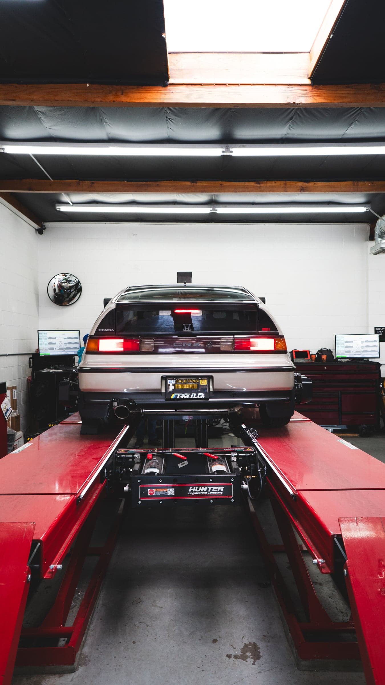 Main repair bay — frame machines and spray booth